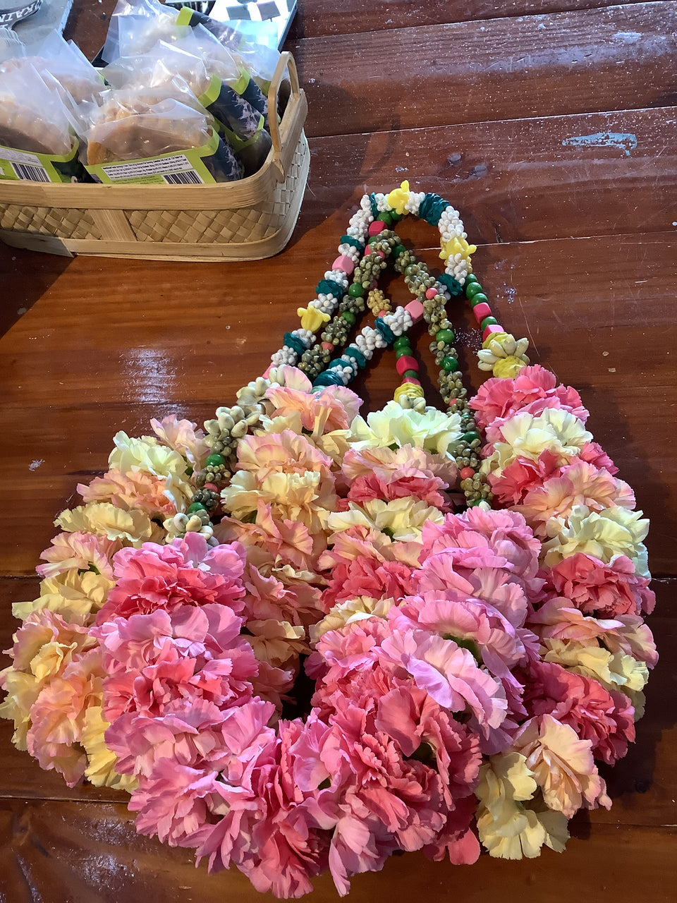 3 Priscilla lei on a wooden table