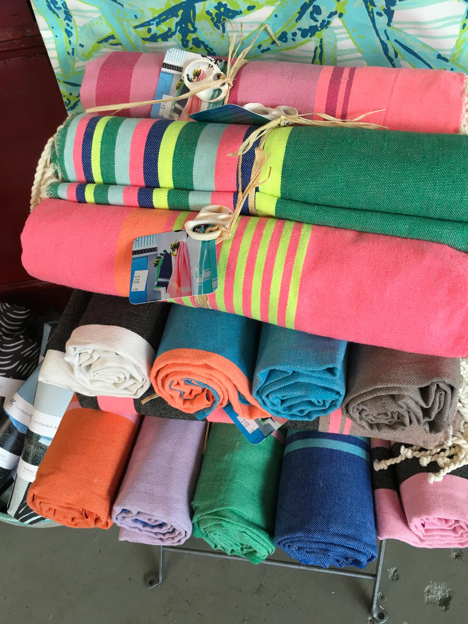 turkish towels rolled and stacked in the store