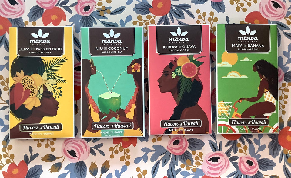 Shows 4 Manoa chocolate bars on flowered background