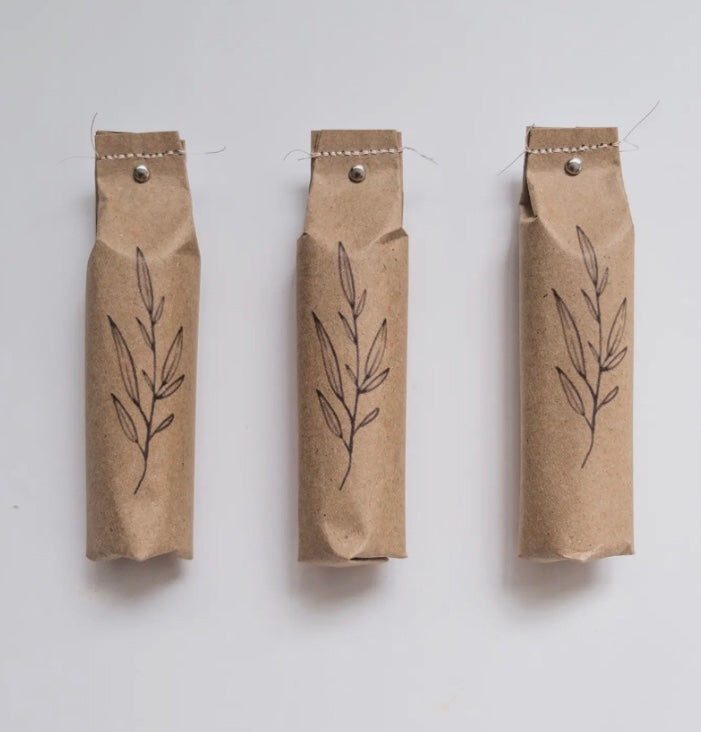 tree packaged clay masks on white background 