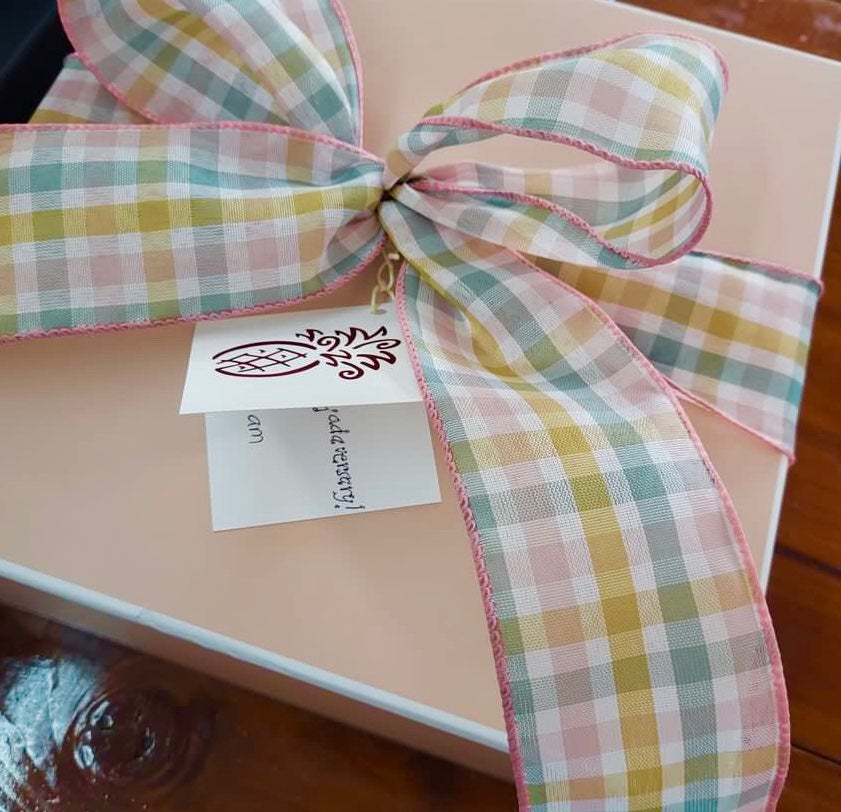 example of boxed gift with ribbonand gift tag
