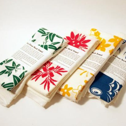 colorful dishtowels with hawaiian print
