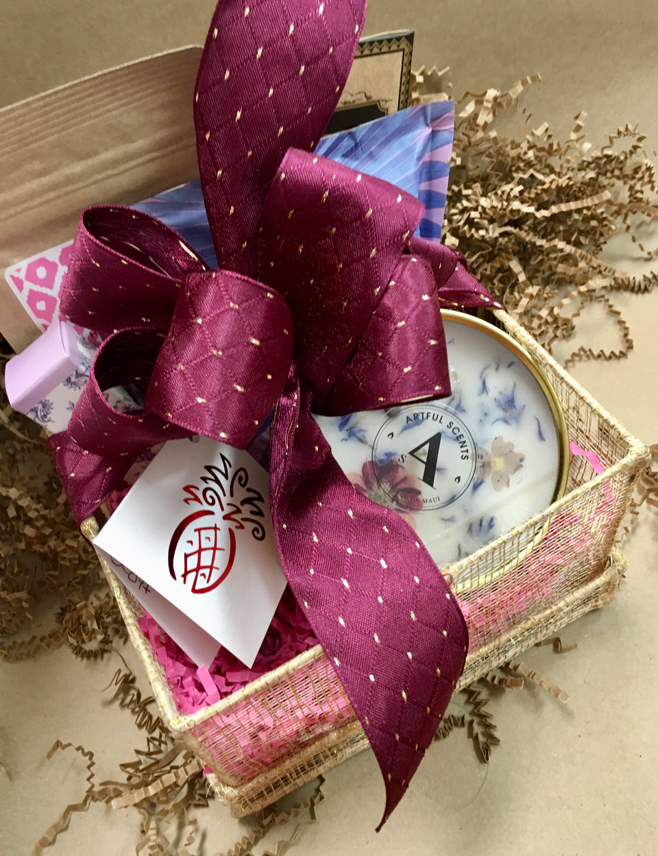photo of gifts with a ribbon on open box