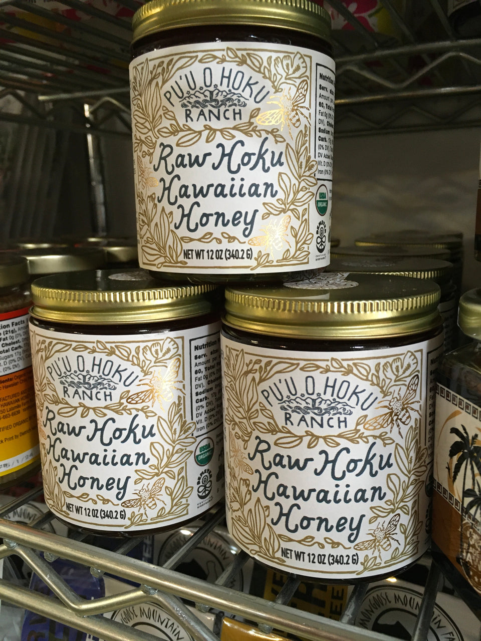 Jars of honey on the shelf in our store