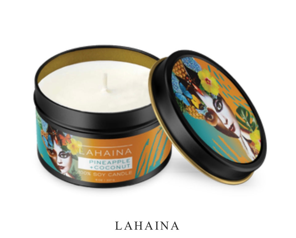 Lahaina Candle lid is open tipped to the side. lid has a photo of a woman.