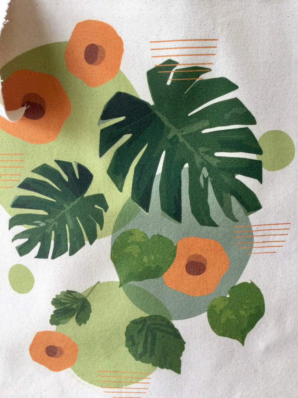 Showing close up detail shot of the design on the tote 