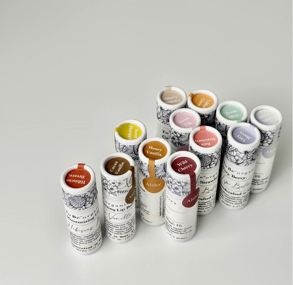 Grouping of lip balms that are available by to be Organics 