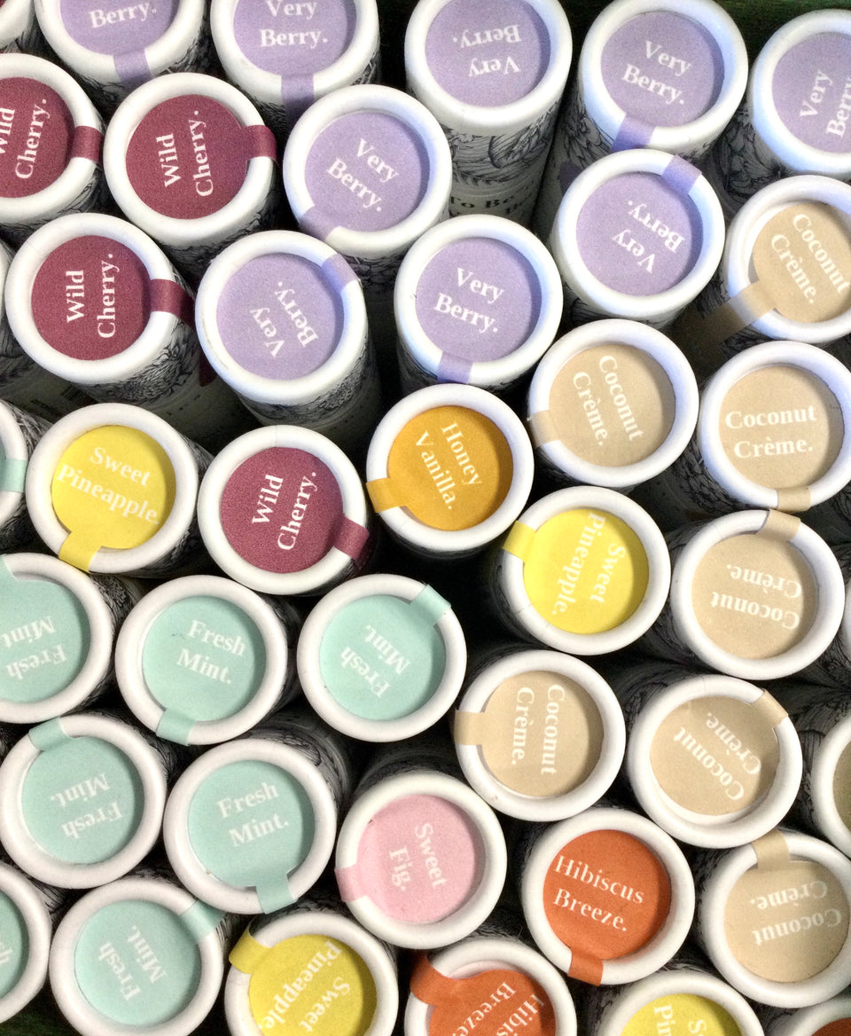 Showing some of the flavors of lip balm packages from the top