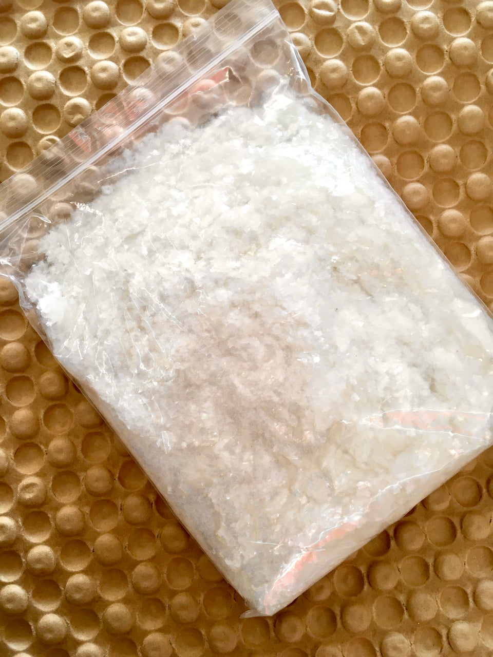 shows the snow in a zip loc type bag