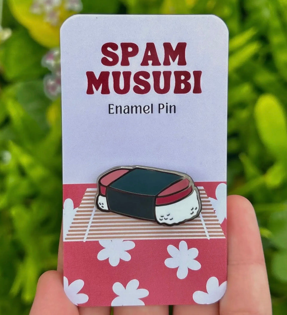 Enamel pins made by artist Mahea Leah