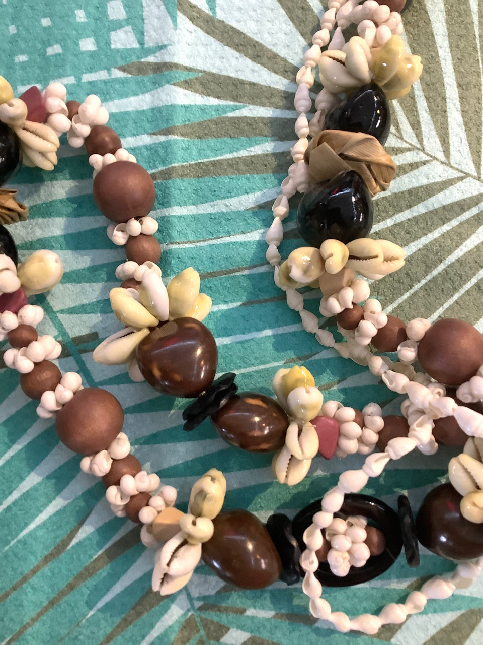 Showing closer detail of forever lei on table