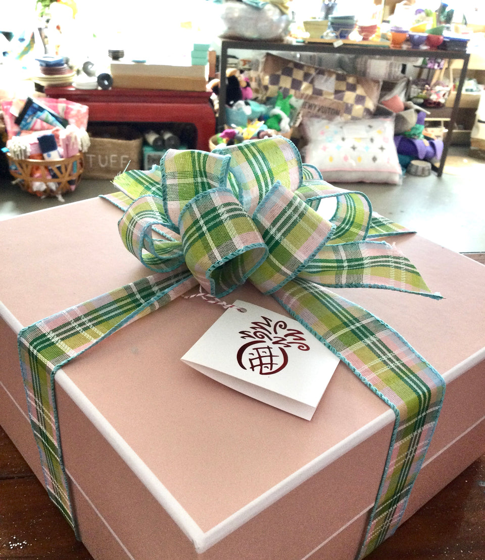Box with decorative ribbon