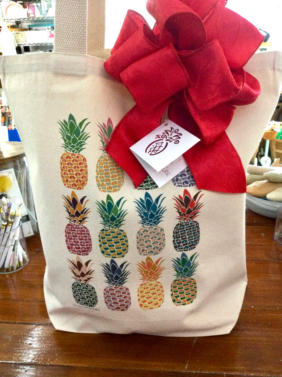 Shows tote filled with ribbon and gift tag