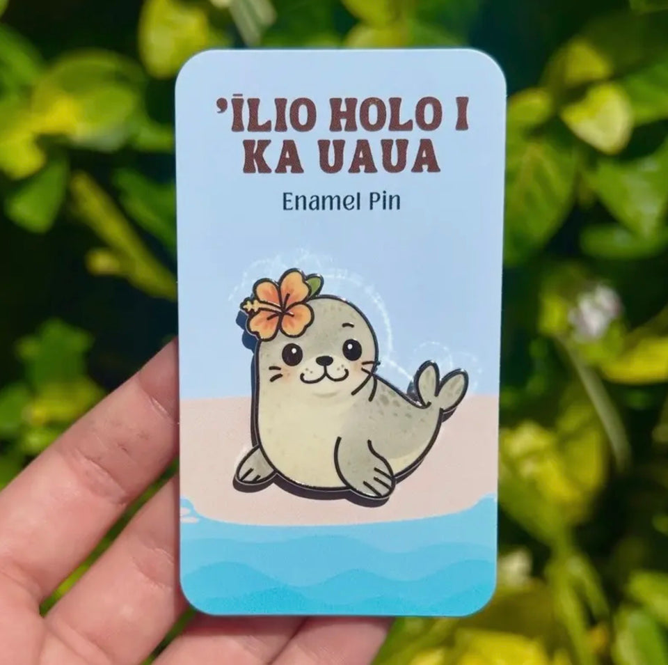 Enamel pins made by artist Mahea Leah