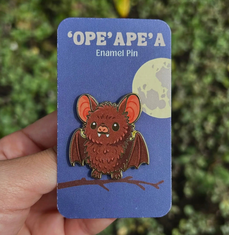 Enamel pins made by artist Mahea Leah