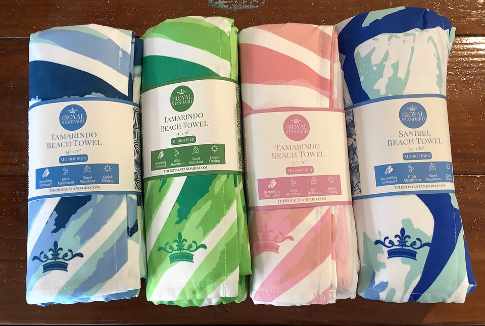 Tamarindo towels and sanibel shells towel rolled in packaging 