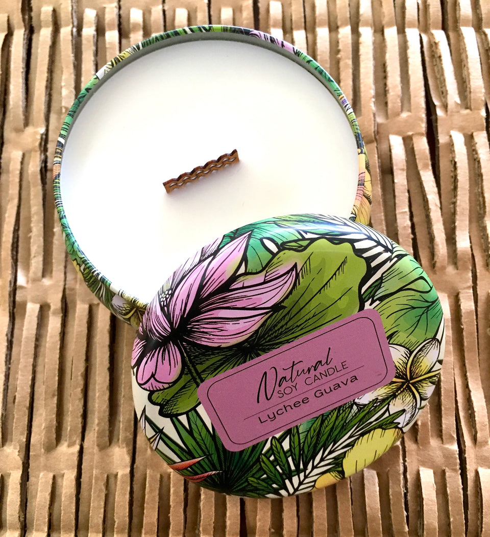 lychee gauva candle tin open to show candle with wooden wick