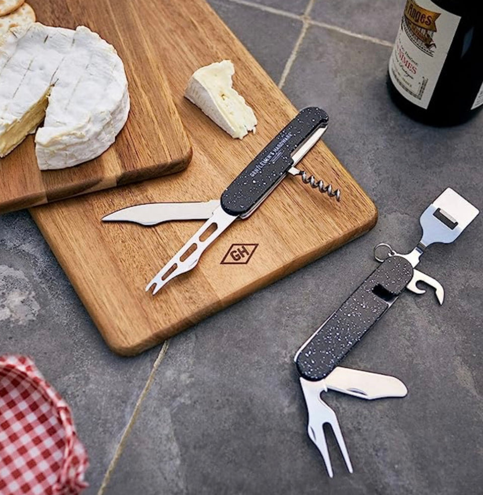 showing tools on a cheese board in use