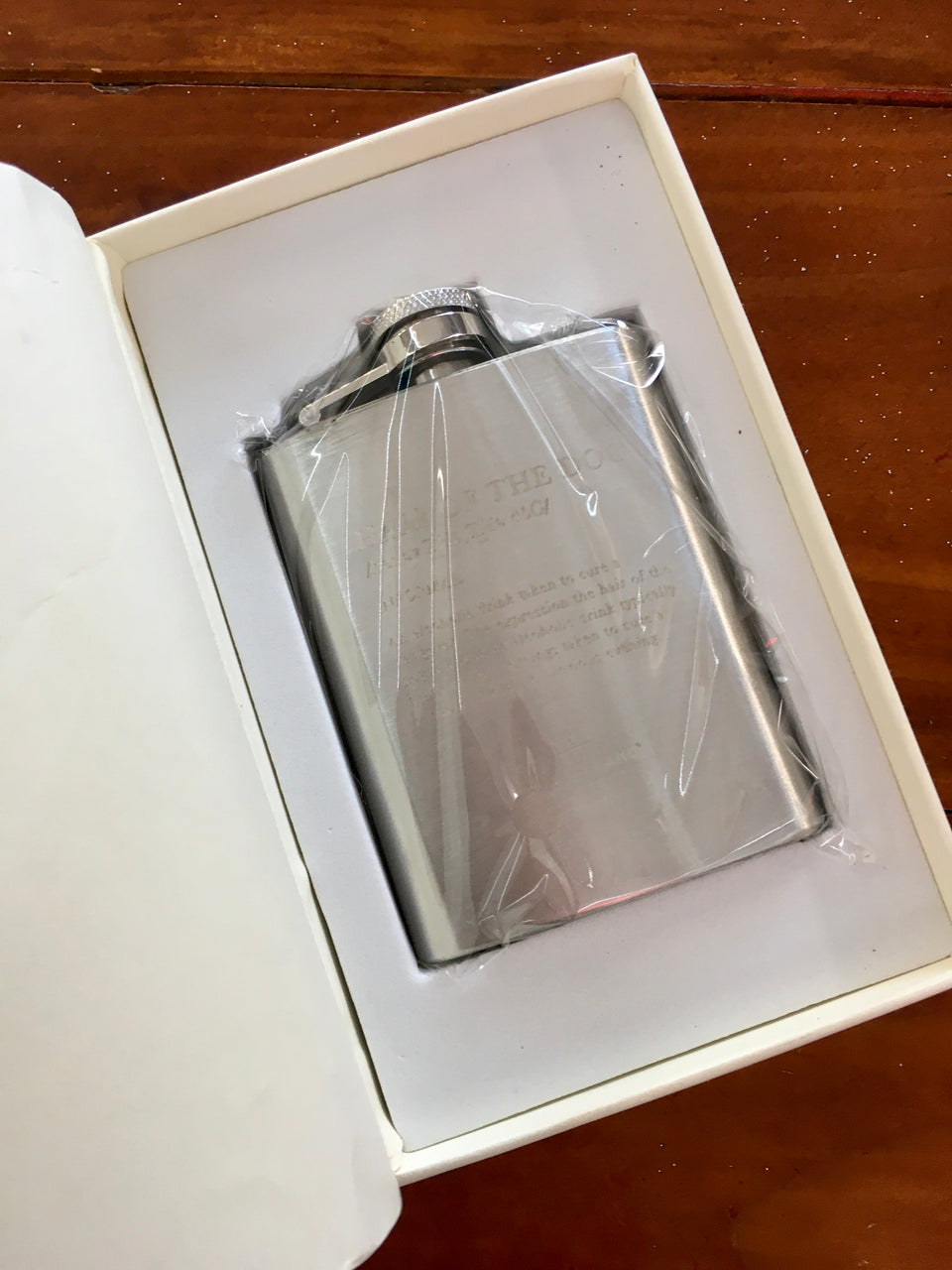 showing flask inside faux book