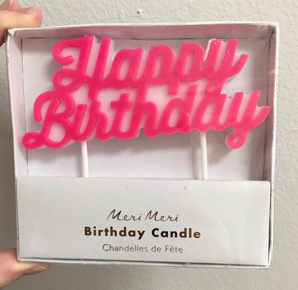 Box with pink candle that says Happy Birthdayhappy birthday candle in pink
