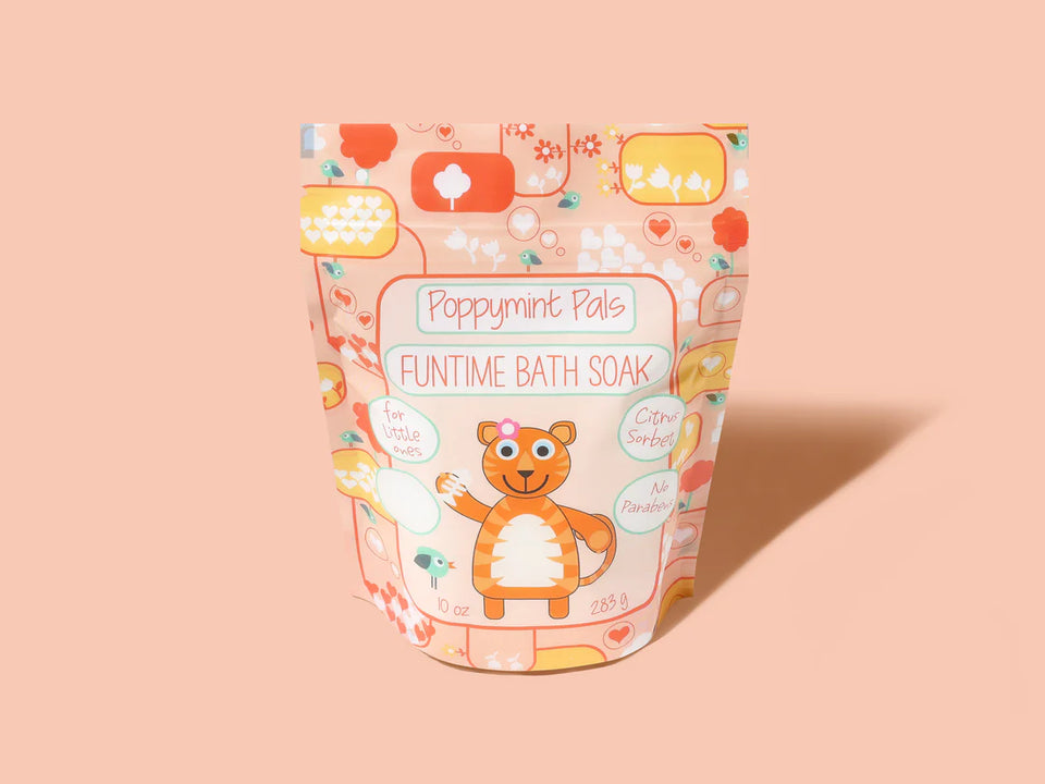 orange funtime bath soak bag with a cat on the front