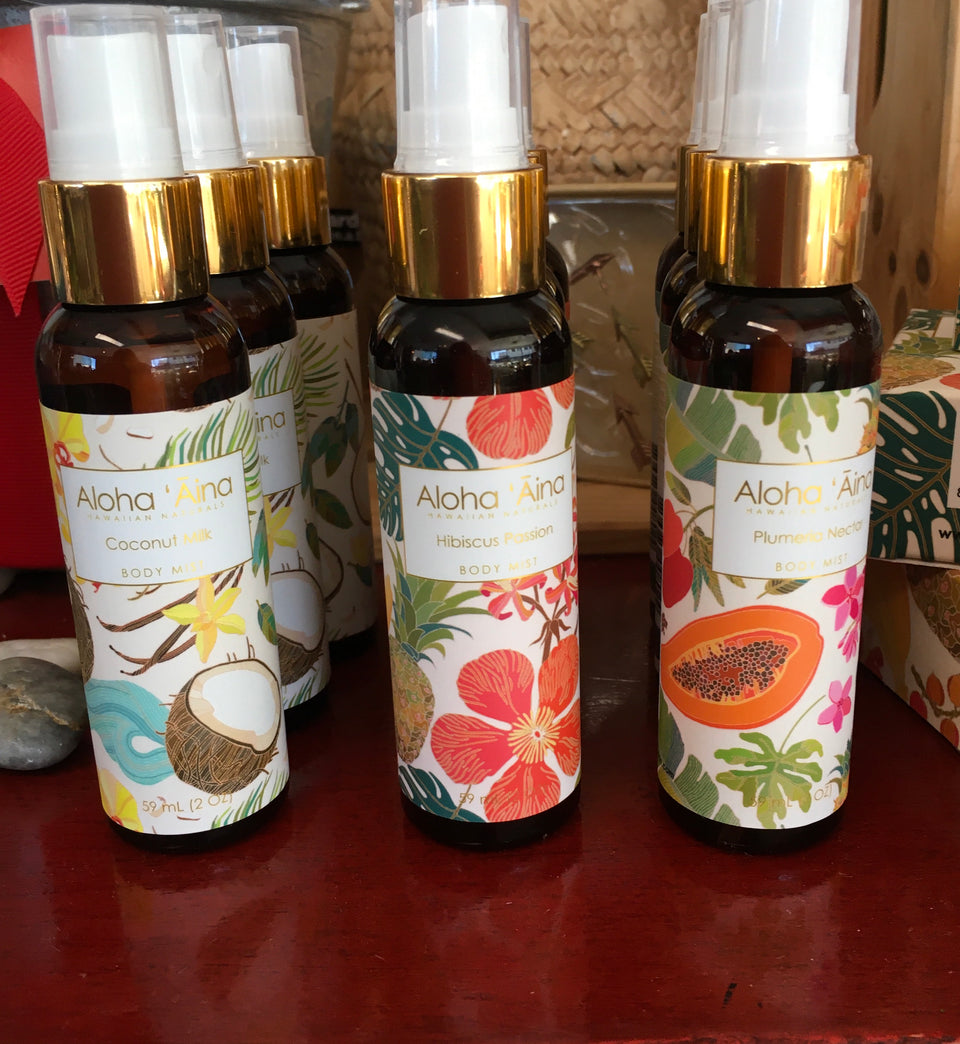 showing all three scents of body mist in the store