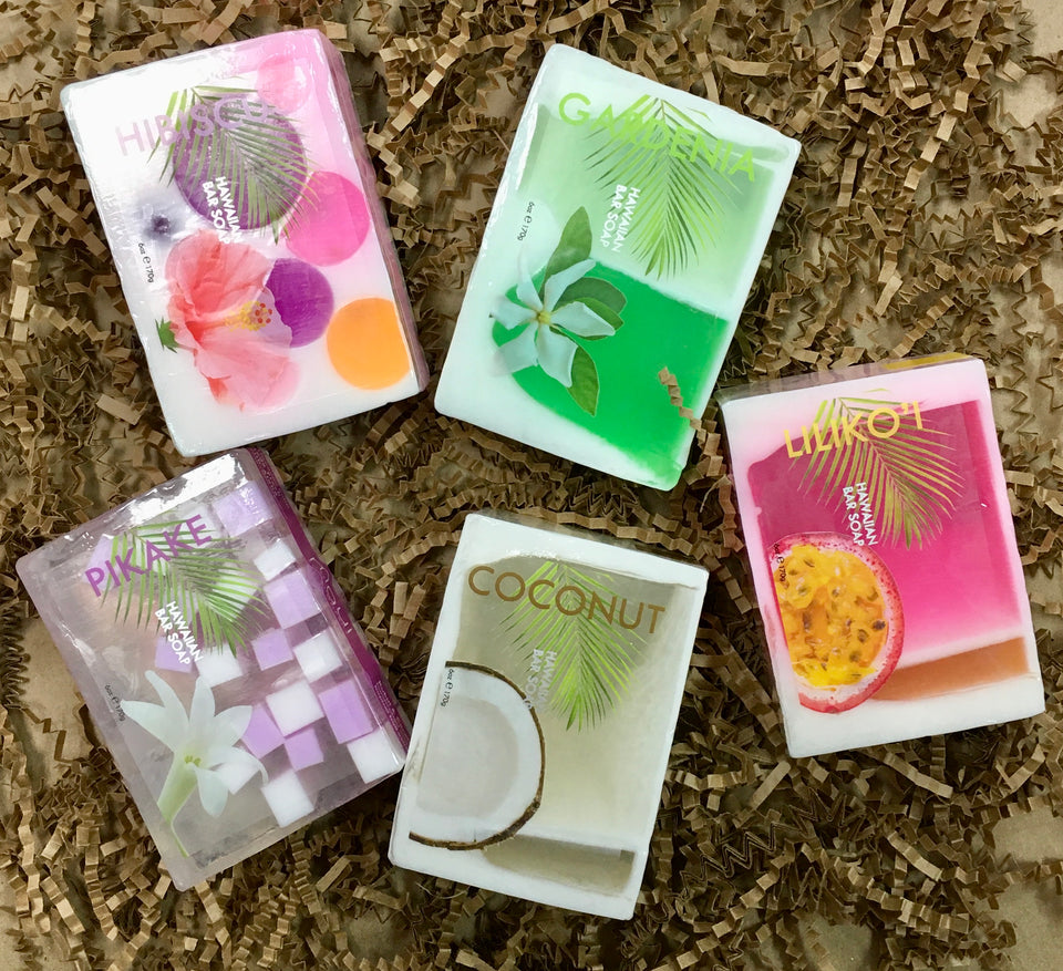 five different soaps with colorful labels