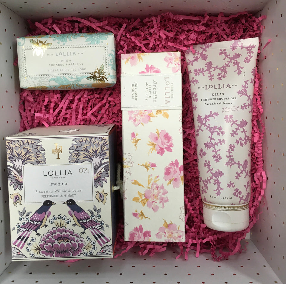 photo of lollia bath items, candle and lotion and soaps 
