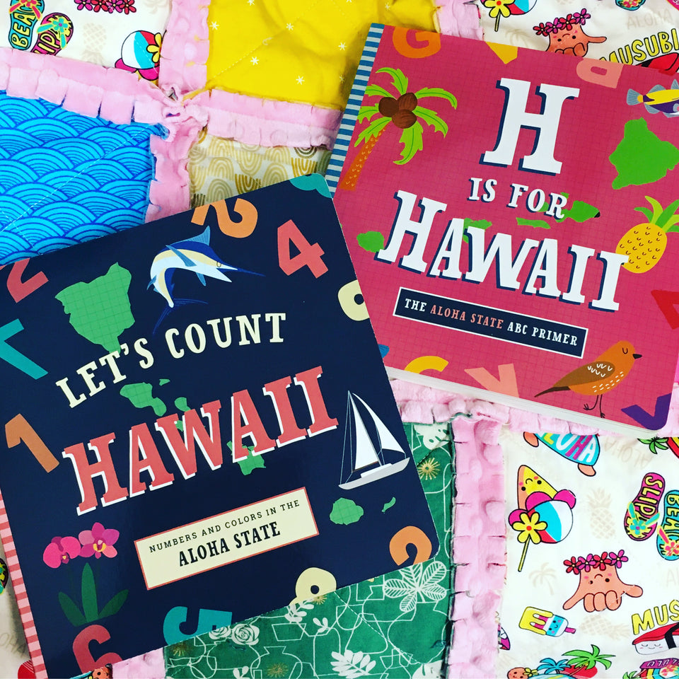 photo of two books laying on a baby patch quilt. One has a blue cover and says Let's count Hawaii numbers and colors in the aloha state. other book says H is for Hawaii the aloha state ABC  both have cartoon kid artwork on the covers.