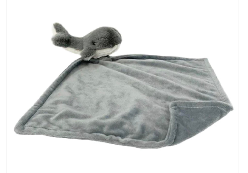 small stuffed whale attached to small blanket