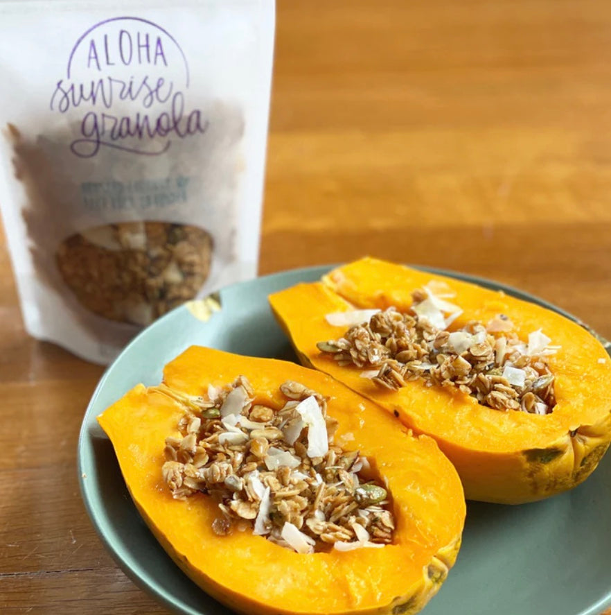 photo of granola inside two papayas