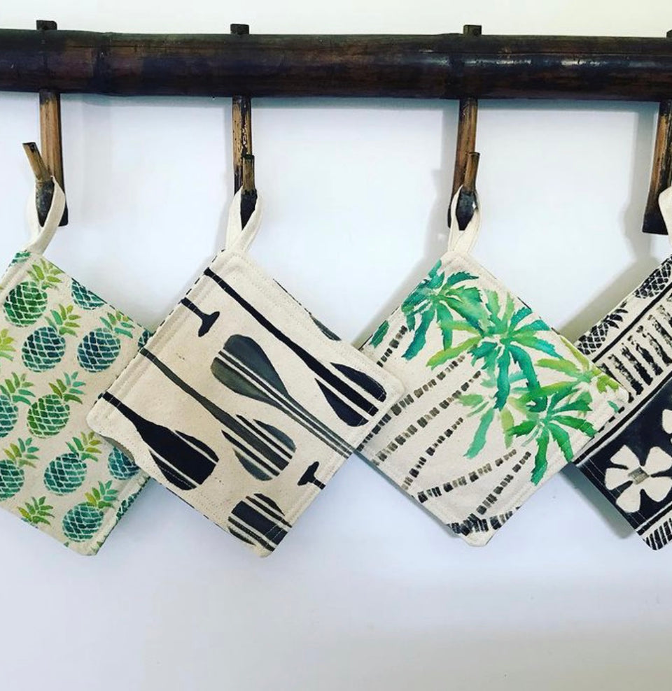 mix of prints of kitchen mitts