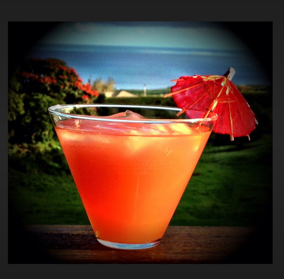 photo of a tropical cocktail with a umbrella